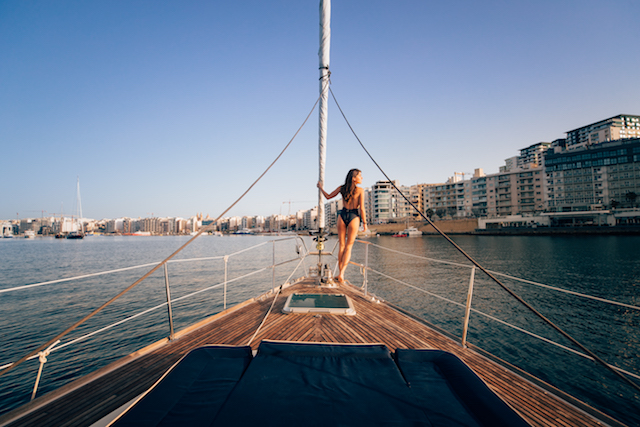 Model on yacht off Silema, Malta